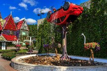 Dubai Miracle Garden - Landscape flower arrangement with a car and a fountain Dubai Miracle Garden - Landscape flower arrangement with a car and a fountain